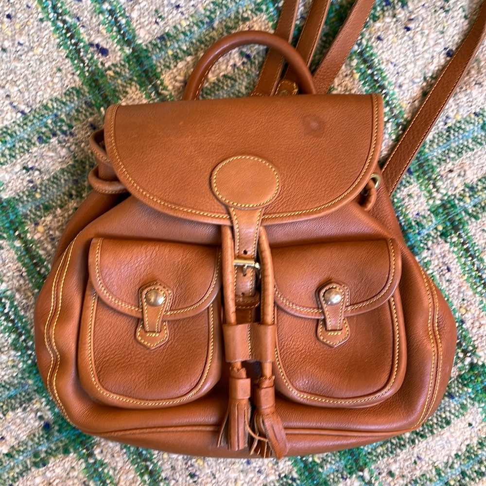 Dooney & Bourke vintage rich leather backpack with exterior snap pockets